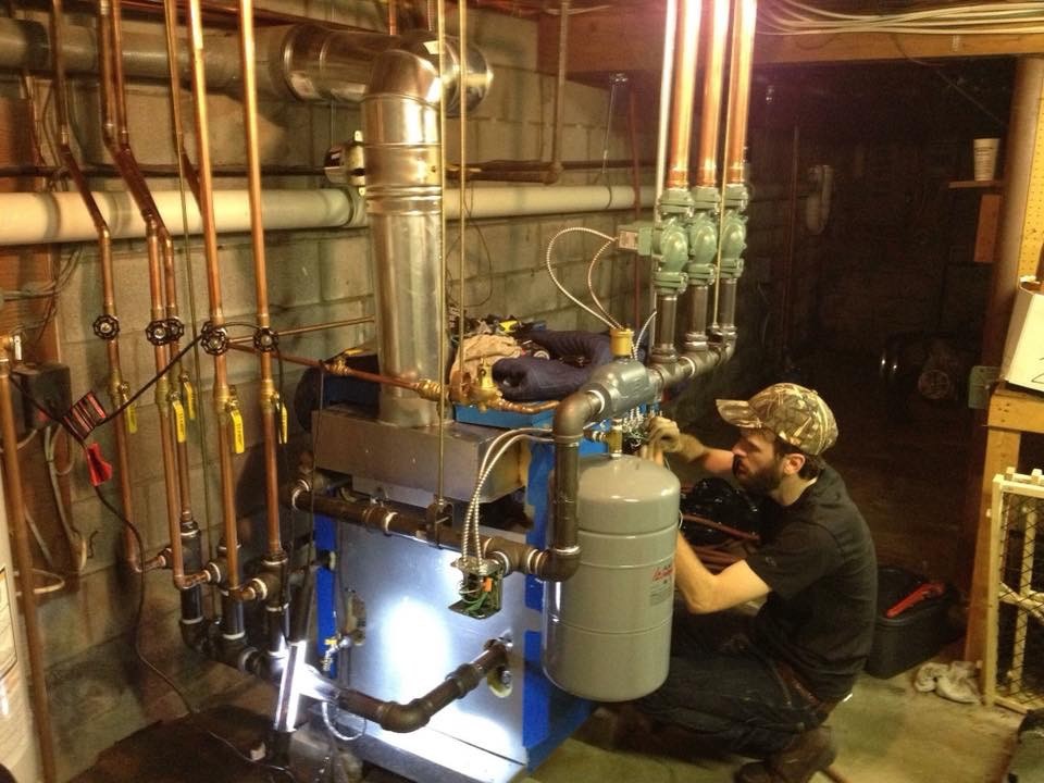 Matthew Wheeler completing a new boiler installation